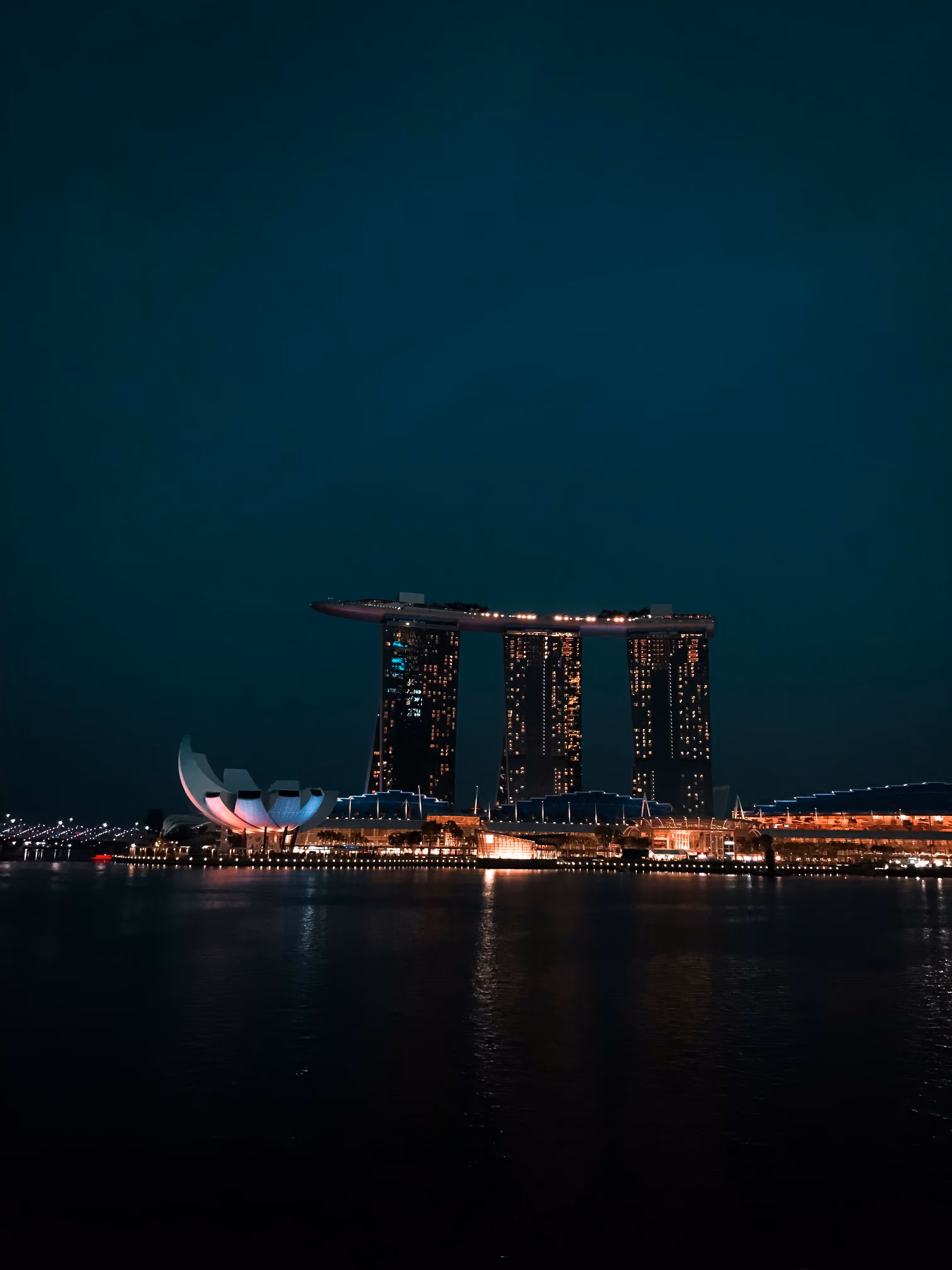 TOKEN2049 Singapore: Marina Bay Sands illuminated at night with waterfront